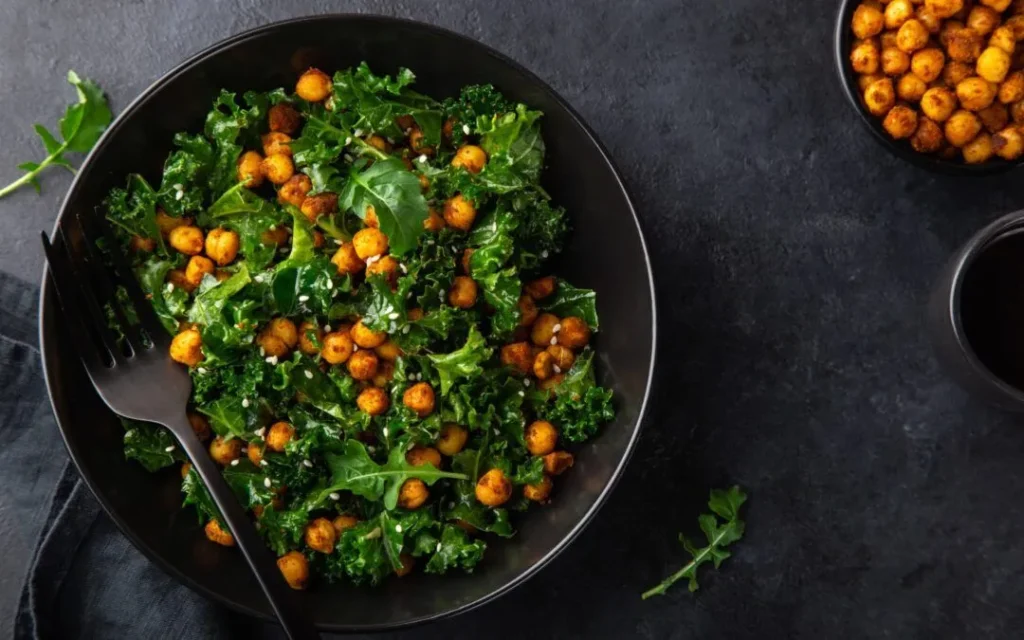 Bowl of kale salad with roasted chickpeas