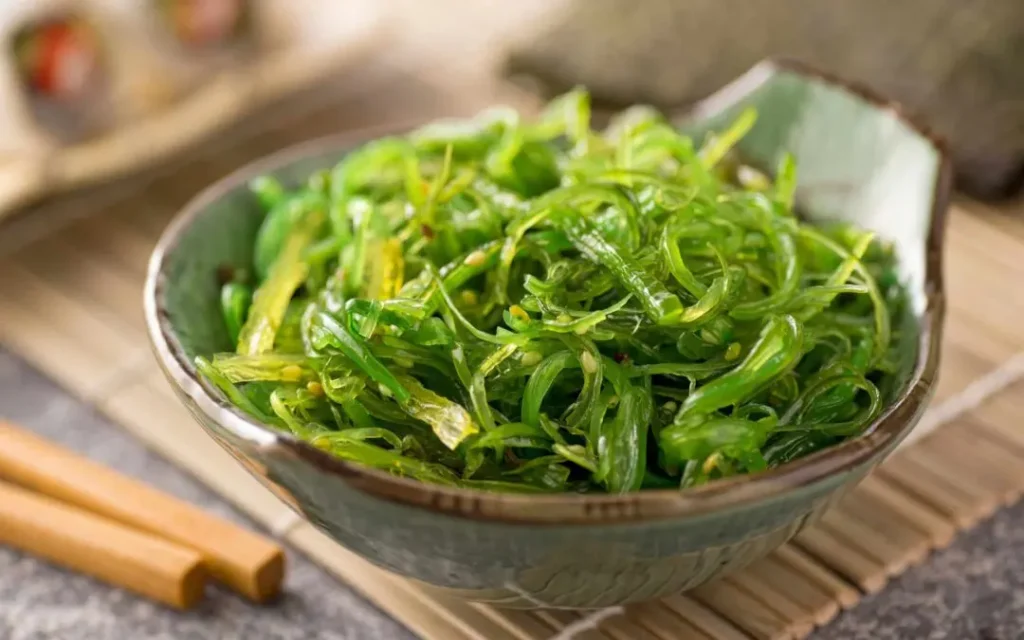 A bowl filled with green vegetables